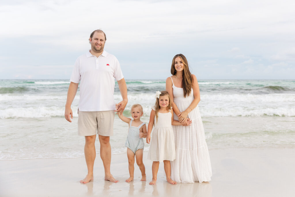 family photos on pensacola beach at sunset