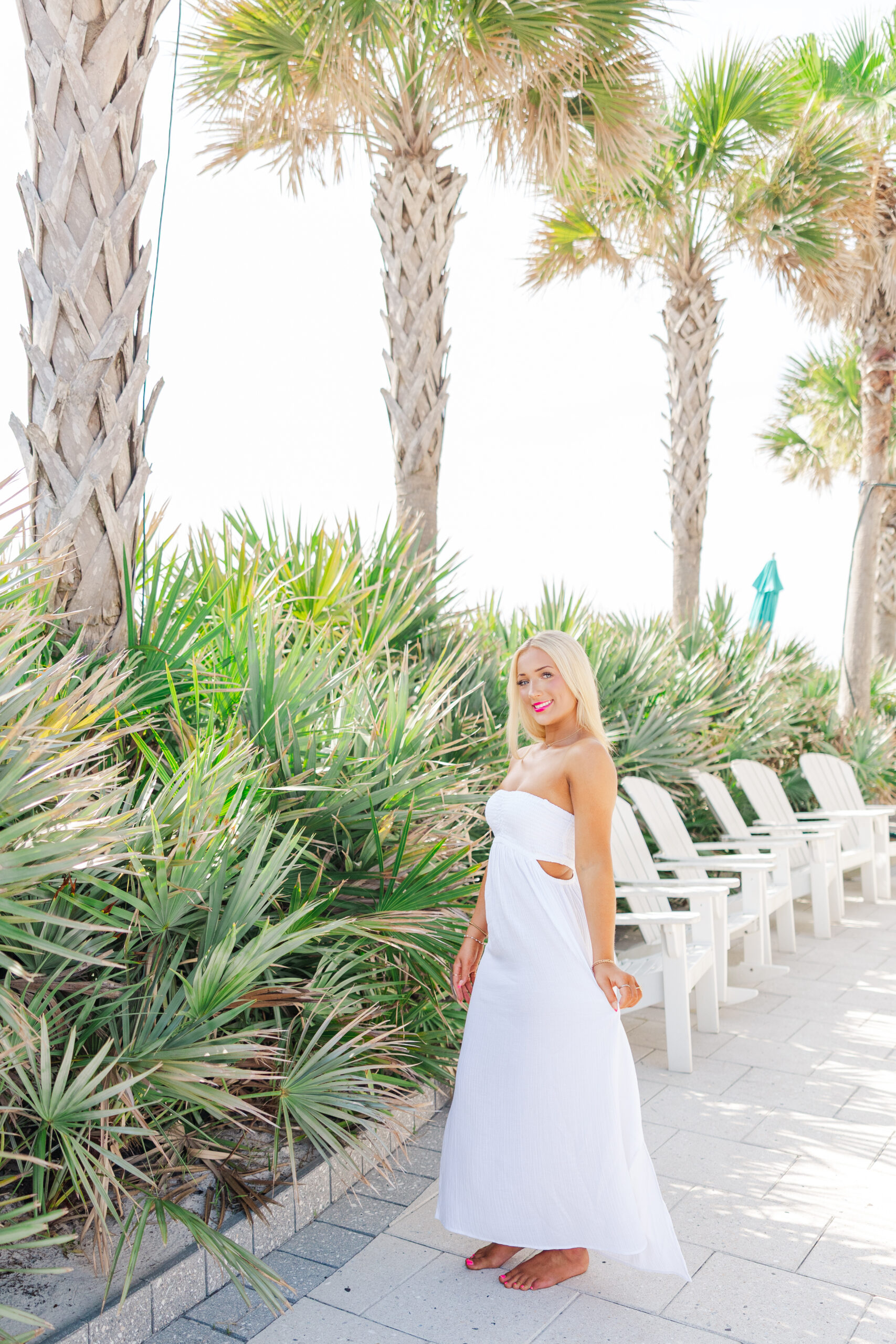 senior portraits pensacola beach by the palm trees