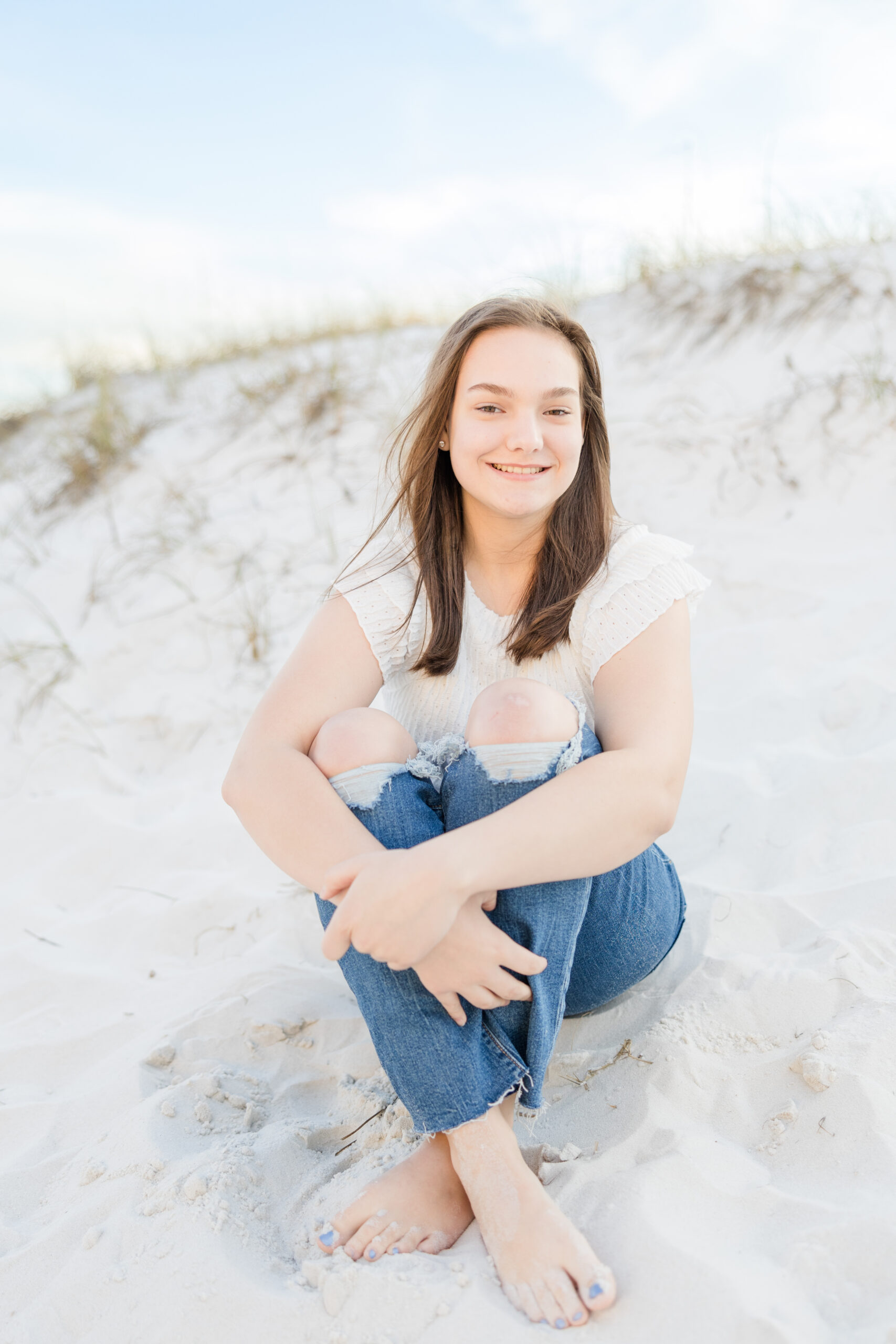 senior girl on the sand at Pensacola Beach