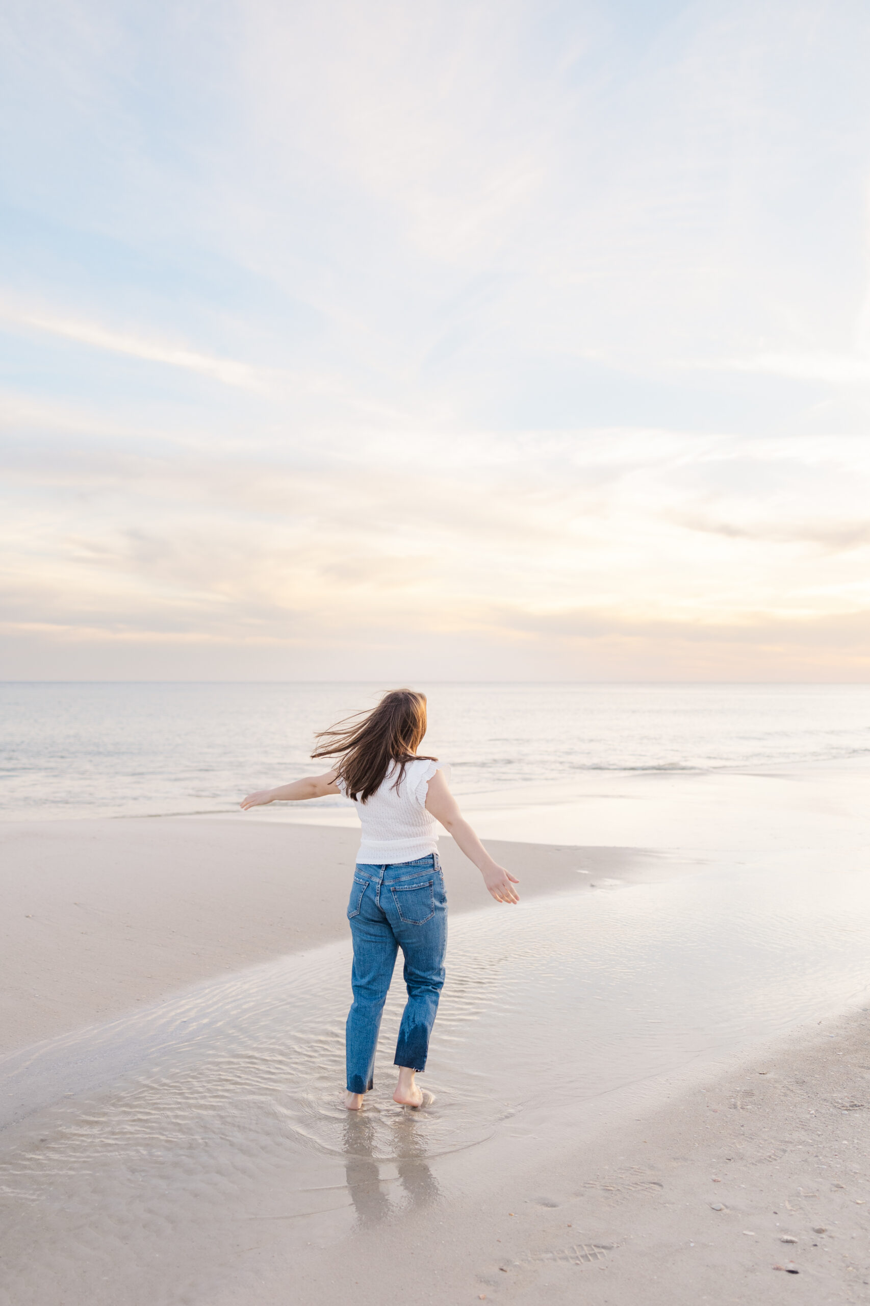 girl on the beach at sunset