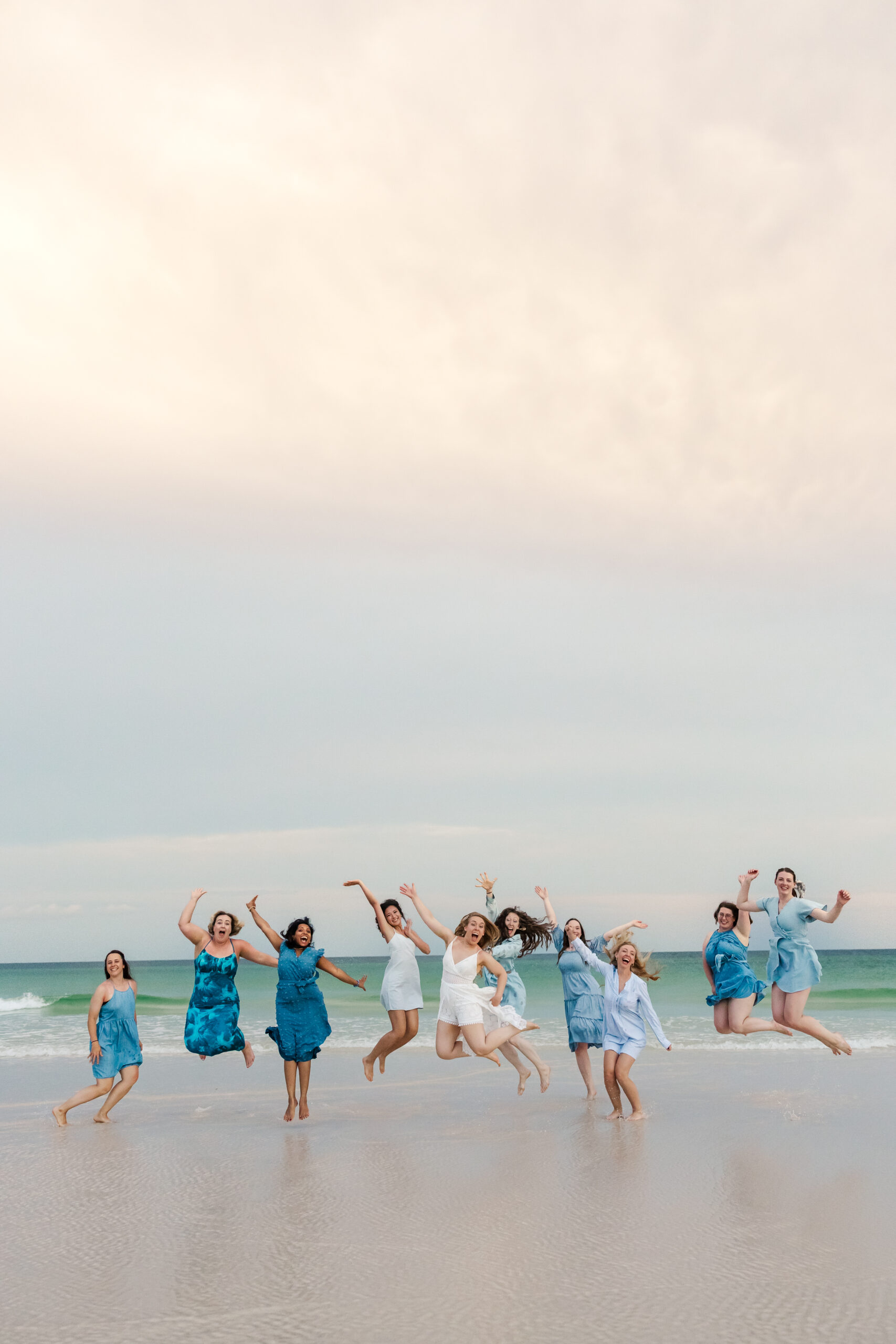 jumping and laughing pensacola beach