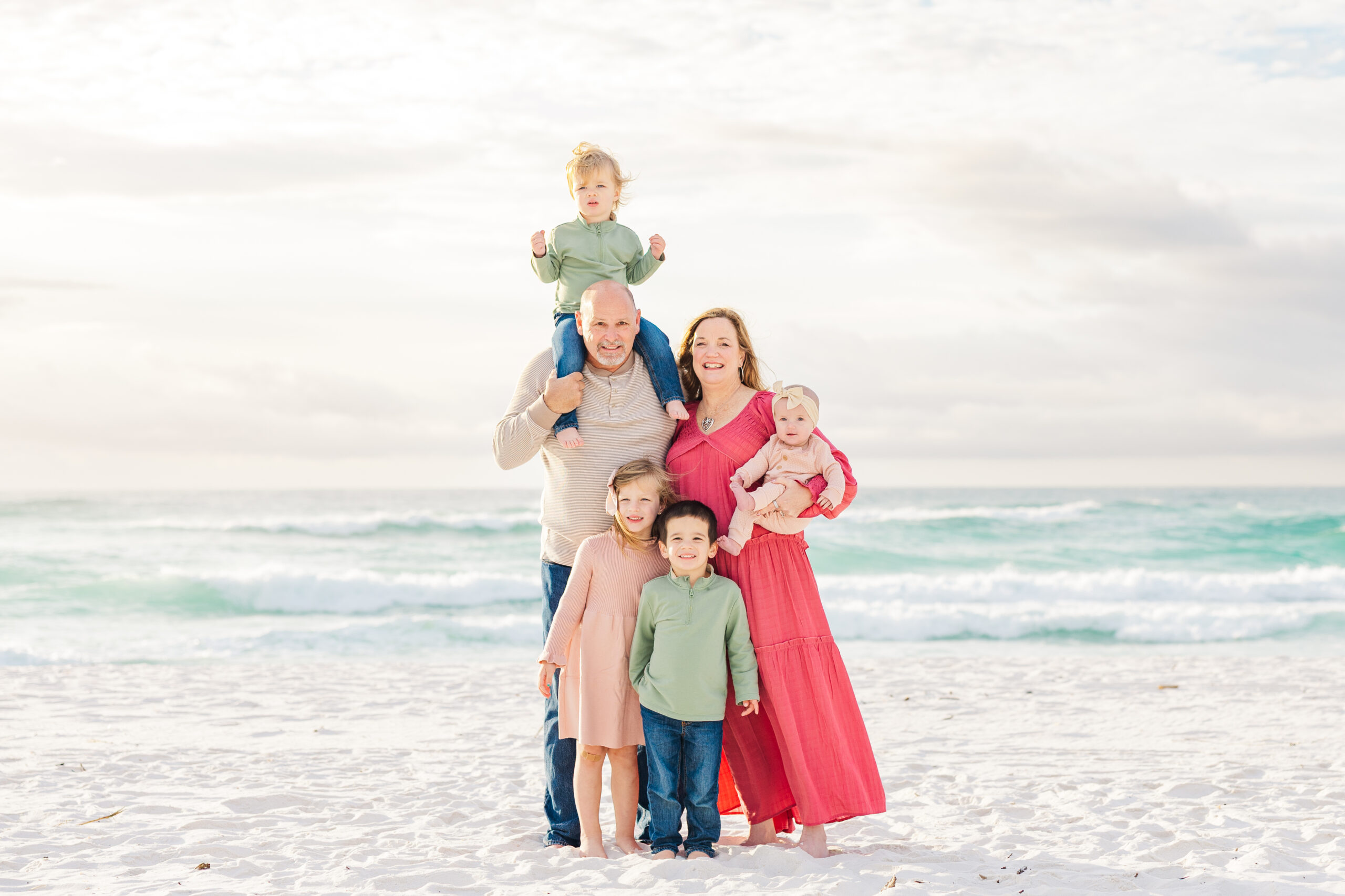 grandparents with grandchildren on pensacola beach